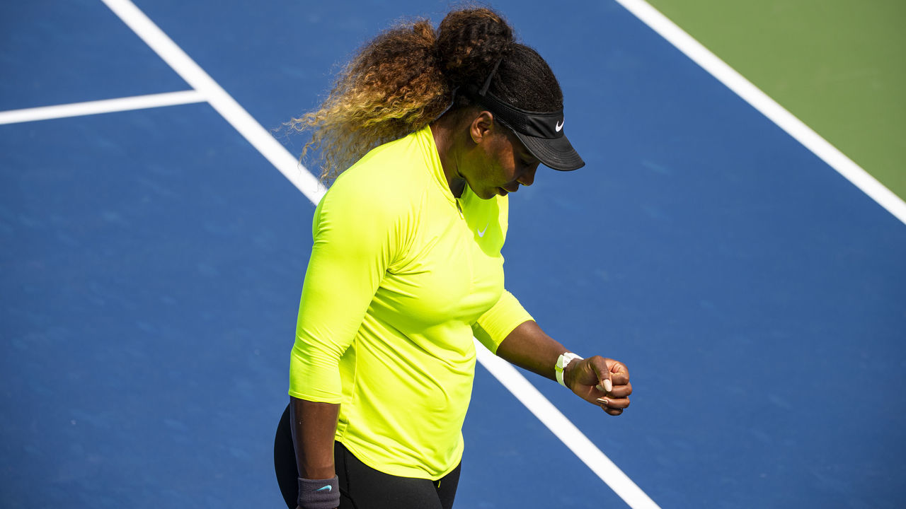 NEW YORK, NEW YORK - AUGUST 21: Serena Williams of the United States appears to have an injured hand during her practice session with her coach Patrick Moratoglou before the US Open at USTA Billie Jean King National Tennis Center on August 21, 2019 in New York City.