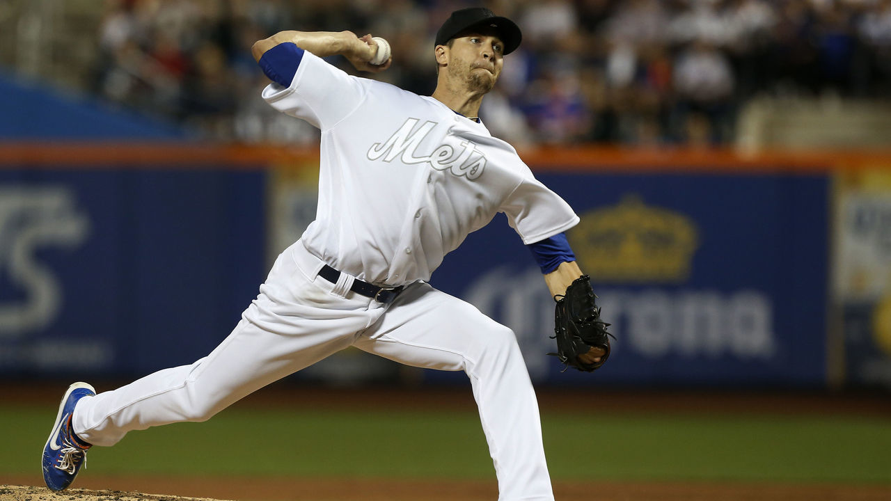 NEW YORK, NEW YORK - AUGUST 23: Jacob deGrom #48 of the New York Mets pitches during the third inning against the Atlanta Braves at Citi Field on August 23, 2019 in New York City. Teams are wearing special color schemed uniforms with players choosing nicknames to display for Players' Weekend.