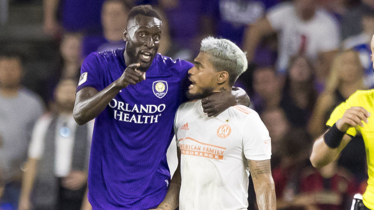 ORLANDO, FL - AUGUST 23: Orlando City defender Lamine Sane (22) andAtlanta United forward Josef Martinez (7) during the MLS soccer match between the Orlando City SC and Atlanta United on August 23, 2019 at Explorer Stadium in Orlando, FL.
