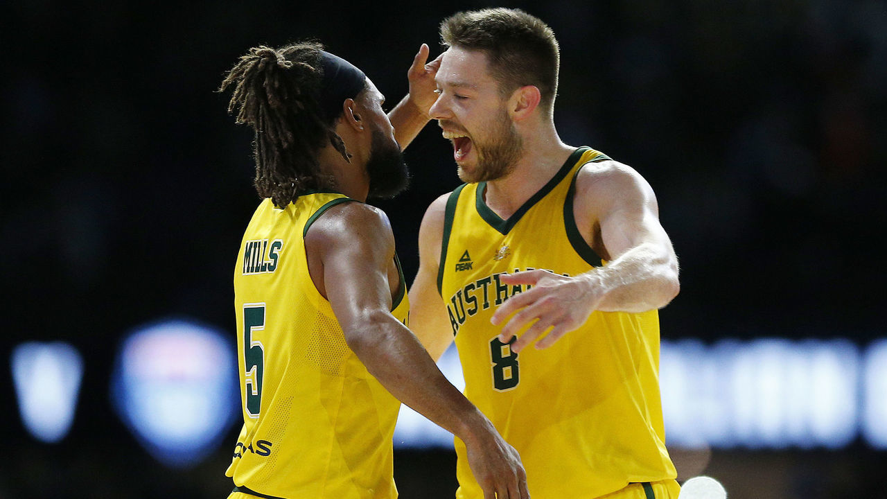 MELBOURNE, AUSTRALIA - AUGUST 24: Patty Mills of the Boomers (L) celebrates with Matthew Dellavedova of the Boomers during game two of the International Basketball series between the Australian Boomers and United States of America at Marvel Stadium on August 24, 2019 in Melbourne, Australia.
