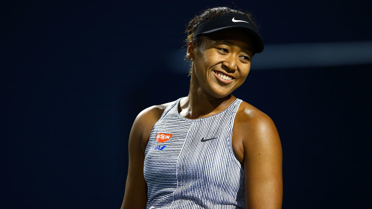 TORONTO, ON - AUGUST 08: Naomi Osaka of Japan reacts against Iga Swiatek of Poland during a third round match on Day 6 of the Rogers Cup at Aviva Centre on August 08, 2019 in Toronto, Canada.