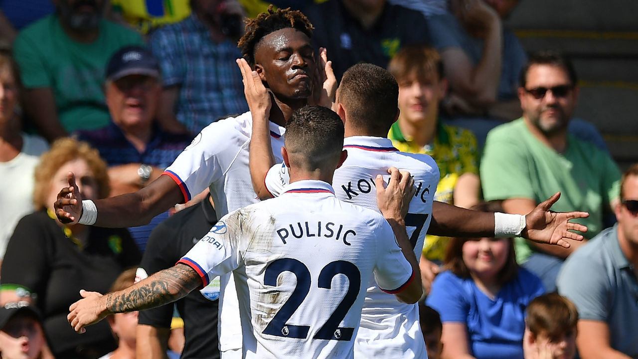 Chelsea's English striker Tammy Abraham (C) celebrates with teammates after scoring his second goal, Chelsea's third during the English Premier League football match between Norwich City and Chelsea at Carrow Road in Norwich, eastern England on August 24, 2019.