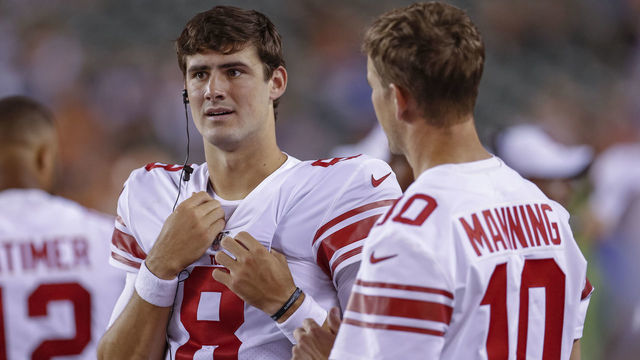 CINCINNATI, OH - AUGUST 22: Daniel Jones #8 and Eli Manning #10 of the New York Giants talk during the preseason game against the Cincinnati Bengals at Paul Brown Stadium on August 22, 2019 in Cincinnati, Ohio.