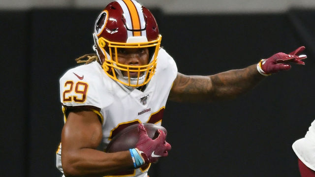 ATLANTA, GA - AUGUST 22: Washington Redskins Running Back Derrius Guice (29) rushes the ball during the NFL preseason game between the Washington Redskins and Atlanta Falcons on August 22, 2019, at Mercedes-Benz Stadium in Atlanta, Ga.