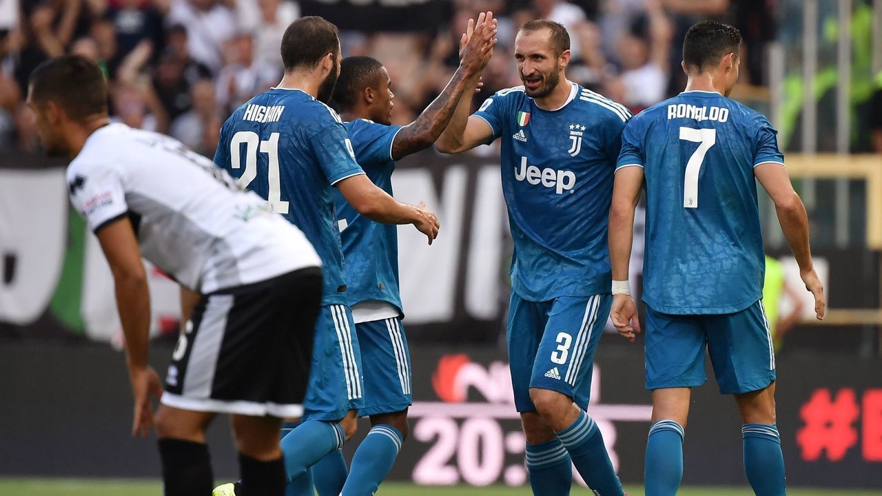Juventus' Italian defender Giorgio Chiellini (2ndR) celebrates after opening the scoring during the Italian Serie A football match Parma vs Juventus on August 24, 2019 at the Ennio-Tardini stadium in Parma.