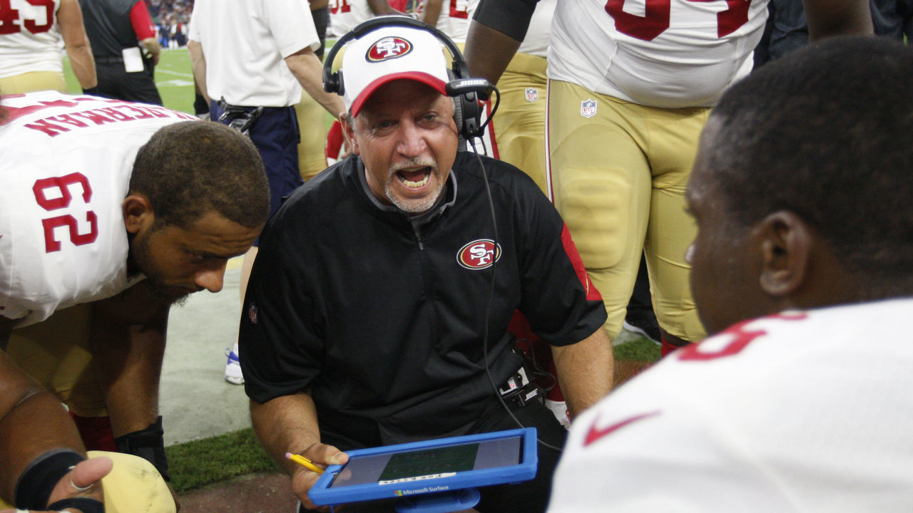 HOUSTON, TX - AUGUST 15: Offensive Line Coach Chris Foerster of the San Francisco 49ers talks with the offensive line during the game against the Houston Texans at NRG Stadium on August 15, 2015 in Houston, Texas. The Texans defeated the 49ers 23-10.
