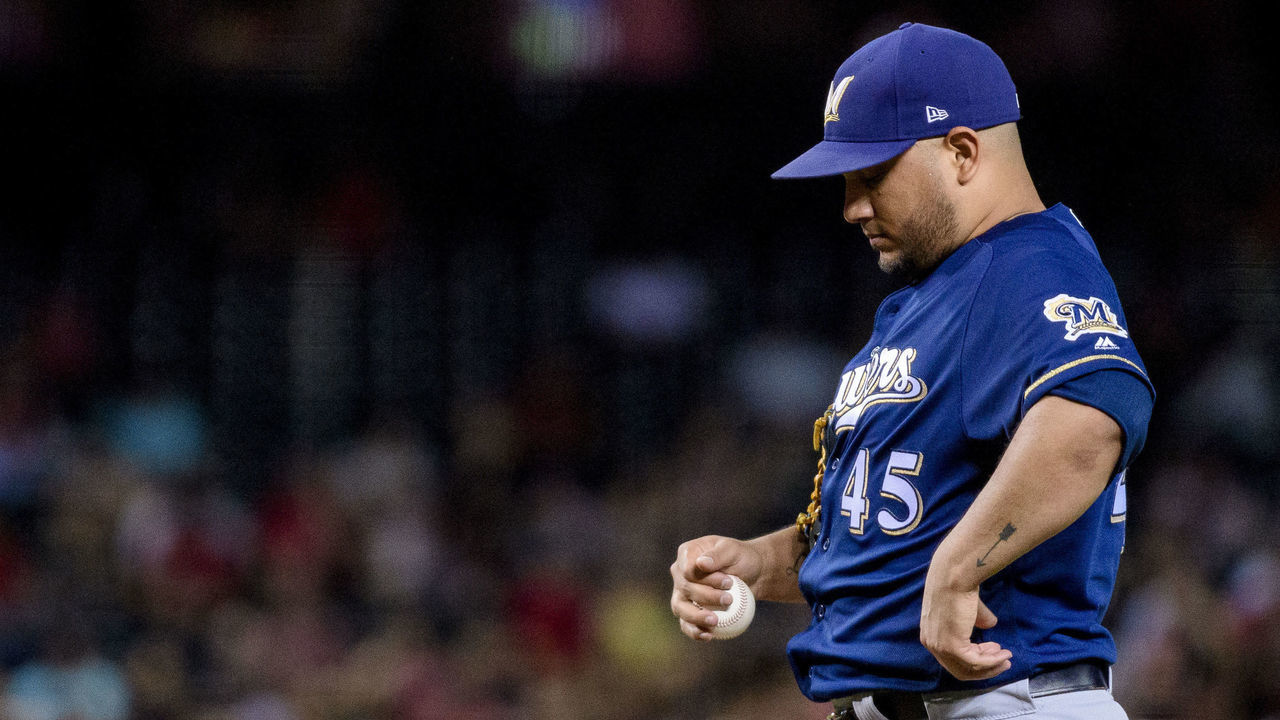 PHOENIX, ARIZONA - JULY 19: Jhoulys Chacin #45 of the Milwaukee Brewers reacts during the third inning of the MLB game against the Arizona Diamondbacks at Chase Field on July 19, 2019 in Phoenix, Arizona. The Diamondbacks won 10-7.