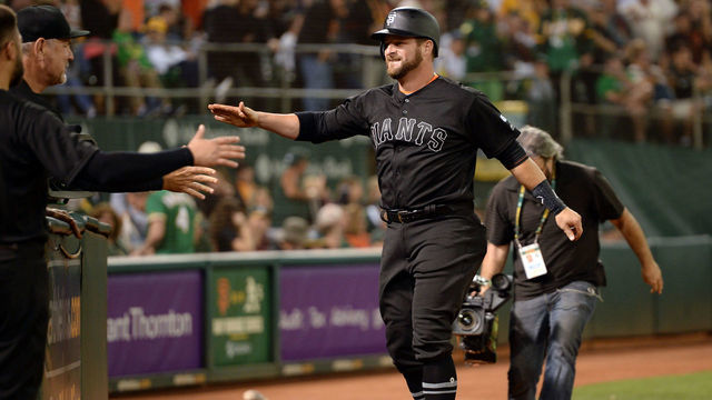 OAKLAND, CA - AUGUST 24: Stephen Vogt #21 of the San Francisco Giants celebrates with teammates during the game against the Oakland Athletics at Oakland Coliseum on Saturday, August 24, 2019 in Oakland, California.