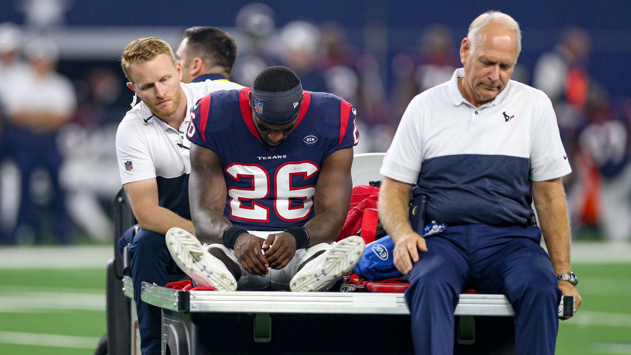 ARLINGTON, TX - AUGUST 24: Houston Texans running back Lamar Miller (26) is carted off the field with an injury during the preseason game between the Houston Texans and Dallas Cowboys on August 24, 2019 at AT&T Stadium in Arlington, TX.