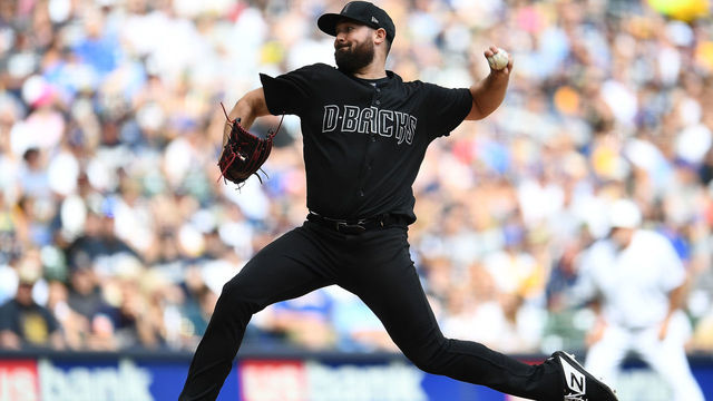 MILWAUKEE, WISCONSIN - AUGUST 25: Robbie Ray #38 of the Arizona Diamondbacks throws a pitch during the fourth inning against the Milwaukee Brewers at Miller Park on August 25, 2019 in Milwaukee, Wisconsin. Teams are wearing special color schemed uniforms with players choosing nicknames to display for Players Weekend.