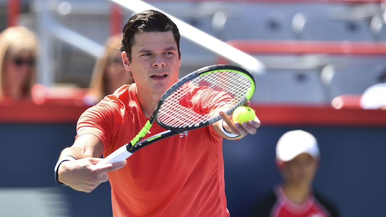 MONTREAL, QC - AUGUST 05: Milos Raonic of Canada prepares to serve against Lucas Pouille of France during day 4 of the Rogers Cup at IGA Stadium on August 5, 2019 in Montreal, Quebec, Canada.