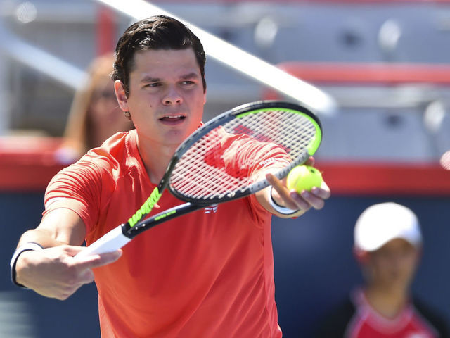 MONTREAL, QC - AUGUST 05: Milos Raonic of Canada prepares to serve against Lucas Pouille of France during day 4 of the Rogers Cup at IGA Stadium on August 5, 2019 in Montreal, Quebec, Canada.