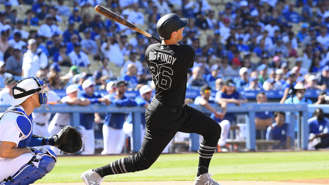 LOS ANGELES, CA - AUGUST 25: New York Yankees first baseman DJ LeMahieu (26) hits a home run during a MLB game between the New York Yankees and the Los Angeles Dodgers on August 25, 2019 at Dodger Stadium in Los Angeles, CA.