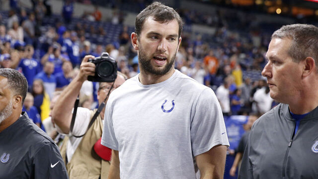 INDIANAPOLIS, INDIANA - AUGUST 24: Andrew Luck #12 of the Indianapolis Colts walks off the field after the Indianapolis Colts preseason game against the Chicago Bears after it was reported that he would be retiring at Lucas Oil Stadium on August 24, 2019 in Indianapolis, Indiana.