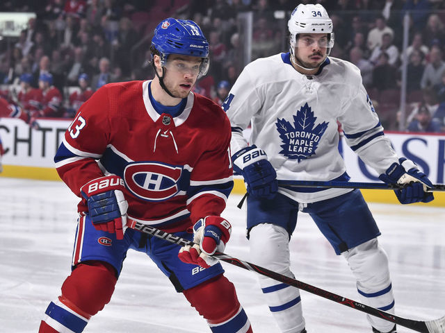 MONTREAL, QC - APRIL 06: Max Domi #13 of the Montreal Canadiens skates against Auston Matthews #34 of the Toronto Maple Leafs during the NHL game at the Bell Centre on April 6, 2019 in Montreal, Quebec, Canada. The Montreal Canadiens defeated the Toronto Maple Leafs 6-5 in a shootout.