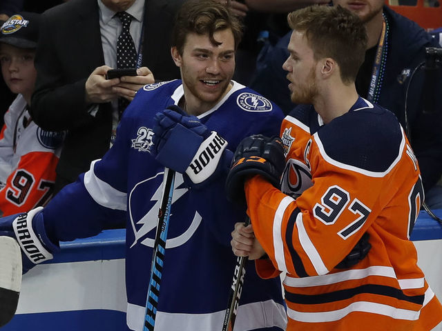 TAMPA, FL - JANUARY 27: Tampa Bay Lightning center Brayden Point (21) and Edmonton Oilers forward Connor McDavid (97) talk during the NHL All-Star Skills Competition on January 27, 2018 at Amalie Arena in Tampa, FL.