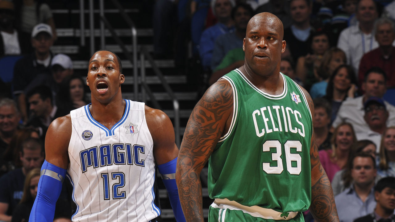 ORLANDO, FL - DECEMBER 25: Dwight Howard #12 of the Orlando Magic and Shaquille O'Neal #36 of the Boston Celtics walk up the court during the game on December 25, 2010 at the Amway Center in Orlando, Florida. Mandatory Copyright Notice: Copyright 2010 NBAE