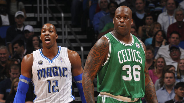 ORLANDO, FL - DECEMBER 25: Dwight Howard #12 of the Orlando Magic and Shaquille O'Neal #36 of the Boston Celtics walk up the court during the game on December 25, 2010 at the Amway Center in Orlando, Florida. Mandatory Copyright Notice: Copyright 2010 NBAE