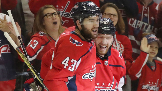 WASHINGTON, DC - MAY 17: Tom Wilson #43 and Evgeny Kuznetsov #92 of the Washington Capitals celebrate a goal against the Tampa Bay Lightning in Game Four of the Eastern Conference Finals during the 2018 NHL Stanley Cup Playoffs at the Capital One Arena on May 17, 2018 in Washington, DC. The Lightning defeated the Capitals 4-2.