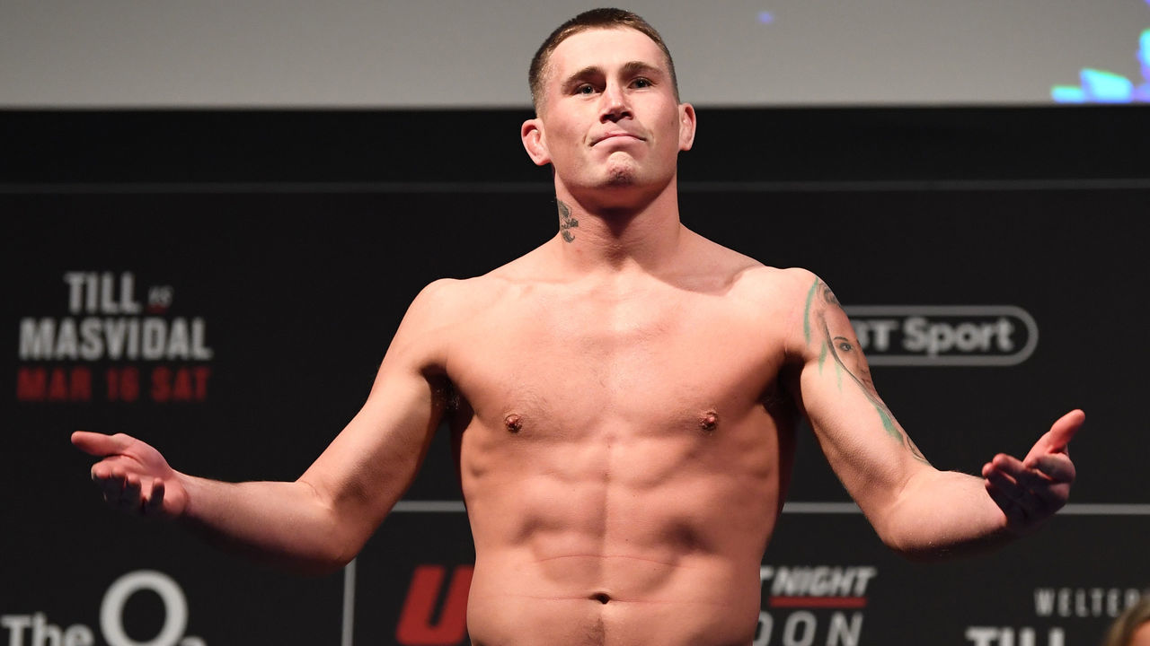 LONDON, ENGLAND - MARCH 15: Darren Till of United Kingdom poses on the scale during the UFC Fight Night weigh-in at The O2 on March 15, 2019 in London, England.