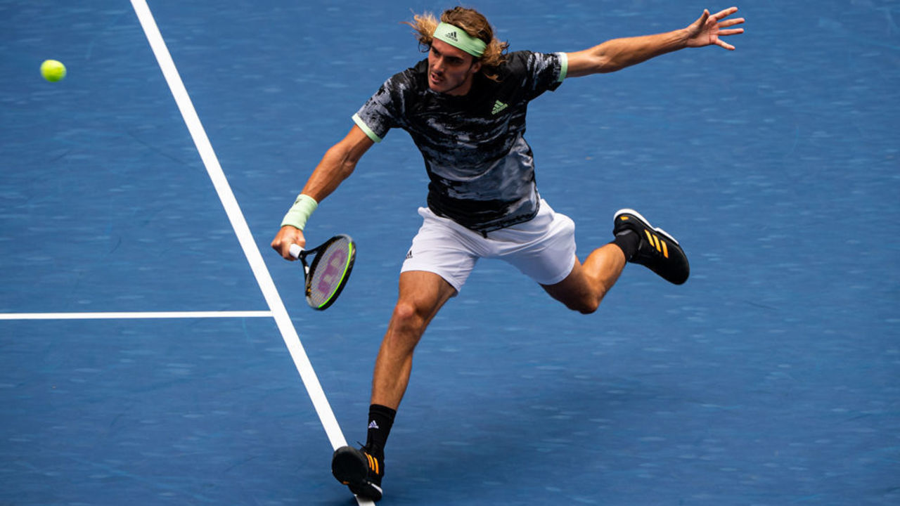 NEW YORK, NEW YORK - AUGUST 27: Stefanos Tsitsipas of Greece hits a forehand against Andrey Rublev of Russia in the first round of the US Open at the USTA Billie Jean King National Tennis Center on August 27, 2019 in New York City.