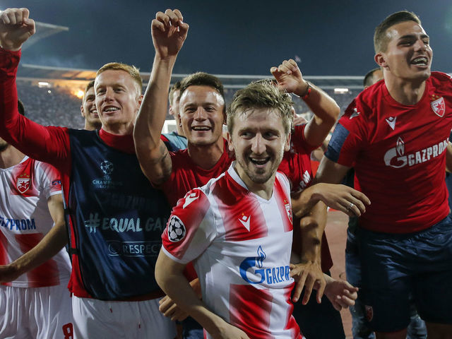 BELGRADE, SERBIA - AUGUST 27: Radovan Pankov (L) Njegos Petrovic (C) and Marko Marin (R) of Crvena Zvezda celebrate after winning the UEFA Champions League Play Off Second Leg match between Crvena Zvezda and Young Boys at stadium Rajko Mitic on August 27, 2019 in Belgrade, Serbia.