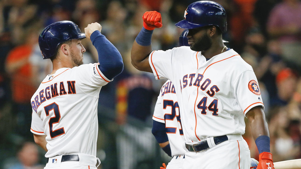 HOUSTON, TEXAS - AUGUST 19: Yordan Alvarez #44 of the Houston Astros celebrates with Alex Bregman #2 after both scored on a double by Yuli Gurriel in the first inning against the Detroit Tigers at Minute Maid Park on August 19, 2019 in Houston, Texas.