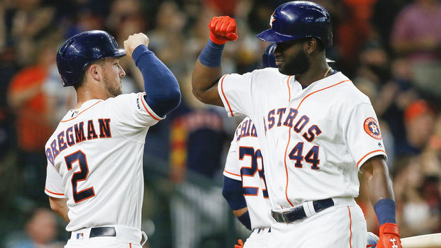 HOUSTON, TEXAS - AUGUST 19: Yordan Alvarez #44 of the Houston Astros celebrates with Alex Bregman #2 after both scored on a double by Yuli Gurriel in the first inning against the Detroit Tigers at Minute Maid Park on August 19, 2019 in Houston, Texas.