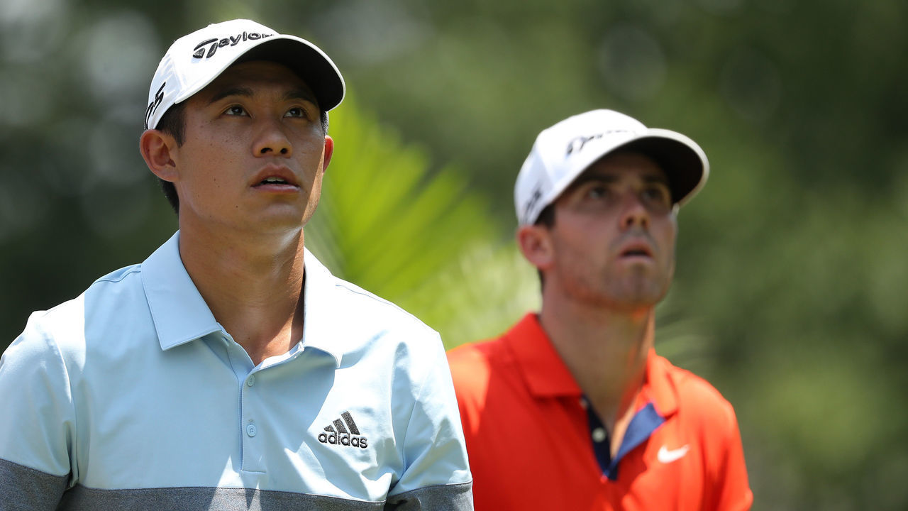 GREENSBORO, NORTH CAROLINA - AUGUST 01: (L-R) Collin Morikawa and Matthew Wolff watch on at the third hole during the first round of the Wyndham Championship at Sedgefield Country Club on August 01, 2019 in Greensboro, North Carolina.