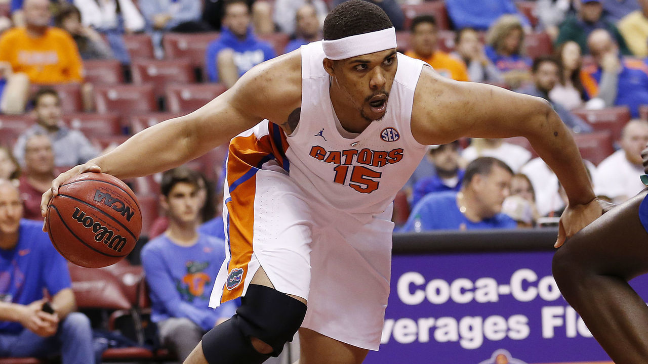 SUNRISE, FLORIDA - DECEMBER 22: Isaiah Stokes #15 of the Florida Gators drives to the basket against against the Florida Gulf Coast Eagles during the Orange Bowl Classic at BB&T Center on December 22, 2018 in Sunrise, Florida.