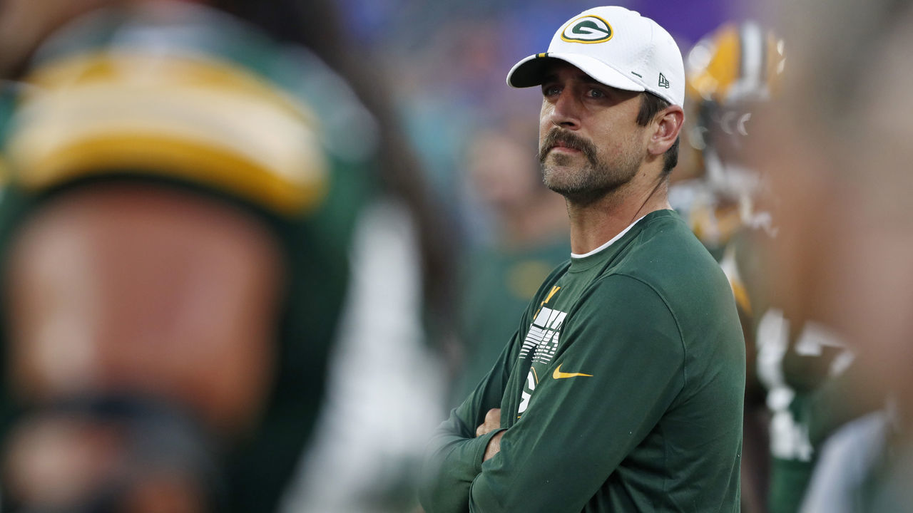 BALTIMORE, MARYLAND - AUGUST 15: Aaron Rodgers #12 of the Green Bay Packers looks on from the sidelines during the first half of a preseason game against the Baltimore Ravens at M&T Bank Stadium on August 15, 2019 in Baltimore, Maryland.