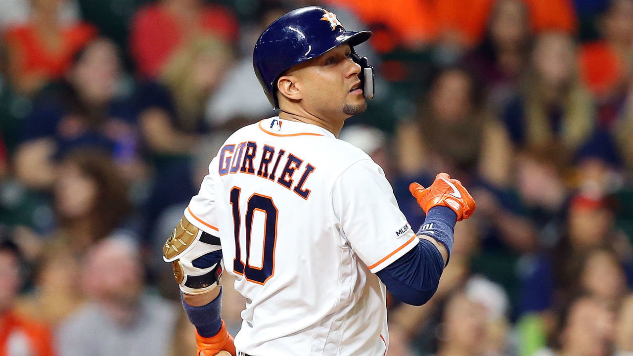 HOUSTON, TEXAS - AUGUST 28: Yuli Gurriel #10 of the Houston Astros hits a two-run home run in the fourth inning against the Tampa Bay Rays at Minute Maid Park on August 28, 2019 in Houston, Texas.