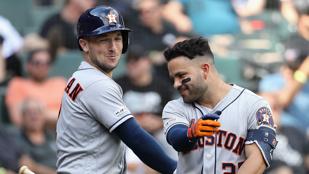 CHICAGO, ILLINOIS - AUGUST 14: Jose Altuve #27 of the Houston Astros celebrates his 22nd home run of the season with Alex Bregman #2 against the Chicago White Sox at Guaranteed Rate Field on August 14, 2019 in Chicago, Illinois.