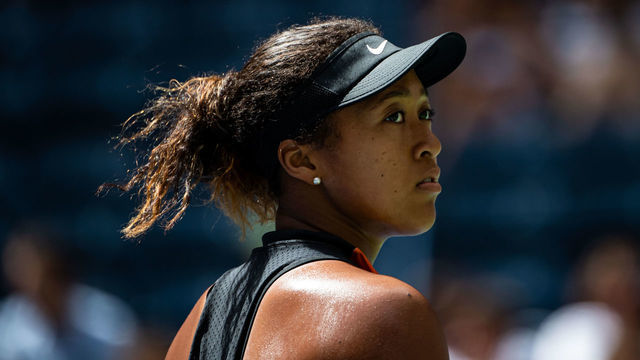 NEW YORK, NEW YORK - AUGUST 27: Naomi Osaka of Japan looks to her box during the match against Anna Blinkova of Russia in the first round of the US Open at the USTA Billie Jean King National Tennis Center on August 27, 2019 in New York City.