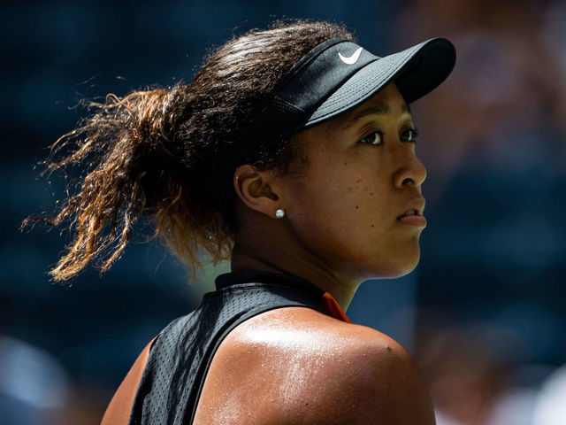 NEW YORK, NEW YORK - AUGUST 27: Naomi Osaka of Japan looks to her box during the match against Anna Blinkova of Russia in the first round of the US Open at the USTA Billie Jean King National Tennis Center on August 27, 2019 in New York City.