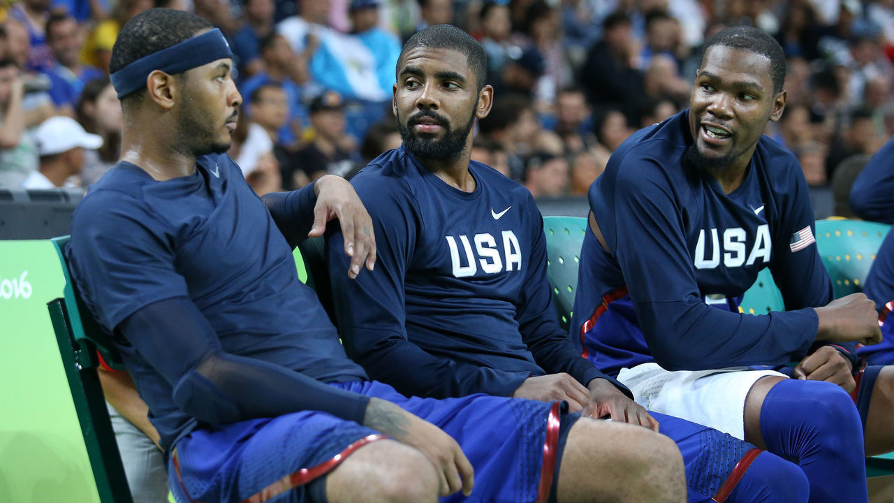 RIO DE JANEIRO, BRAZIL - AUGUST 6: Carmelo Anthony, Kyrie Irving and Kevin Durant of USA during the group phase basketball match between USA and China on day 1 of the Rio 2016 Olympic Games at Carioca Arena 1 on August 6, 2016 in Rio de Janeiro, Brazil.