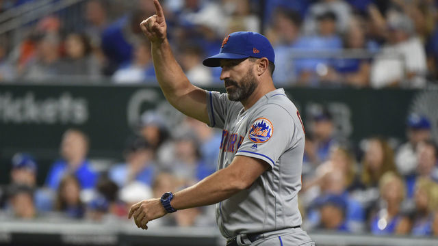 KANSAS CITY, MO - AUGUST 16: Manager Mickey Callaway #36 of the New York Mets signals for a pitching change against the Kansas City Royals at Kauffman Stadium on August 16, 2019 in Kansas City, Missouri.