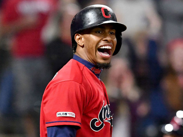 CLEVELAND, OHIO - MAY 24: Francisco Lindor #12 of the Cleveland Indians celebrates after scoring on a single by Roberto Perez #55 during the eighth inning against the Tampa Bay Rays at Progressive Field on May 24, 2019 in Cleveland, Ohio.