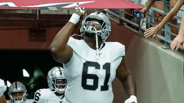 GLENDALE, AZ - AUGUST 15: Oakland Raiders center Rodney Hudson (61) points to the sky while running onto the field before the NFL preseason football game between the Oakland Raiders and the Arizona Cardinals on August 15, 2019 at State Farm Stadium in Glendale, Arizona.