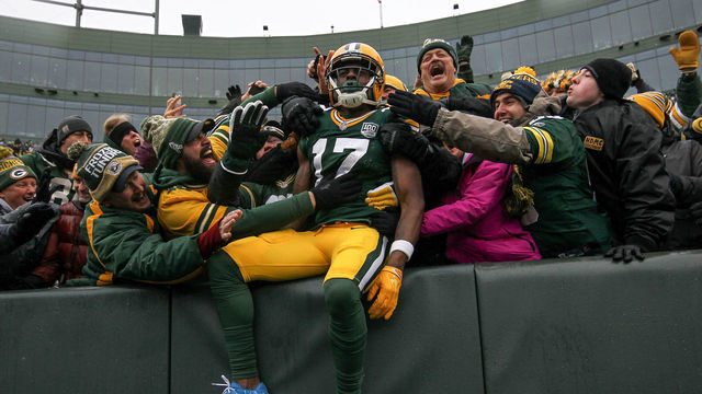 GREEN BAY, WISCONSIN - DECEMBER 02: Davante Adams #17 of the Green Bay Packers celebrates with fans after scoring a touchdown in the second quarter against the Arizona Cardinals at Lambeau Field on December 02, 2018 in Green Bay, Wisconsin.