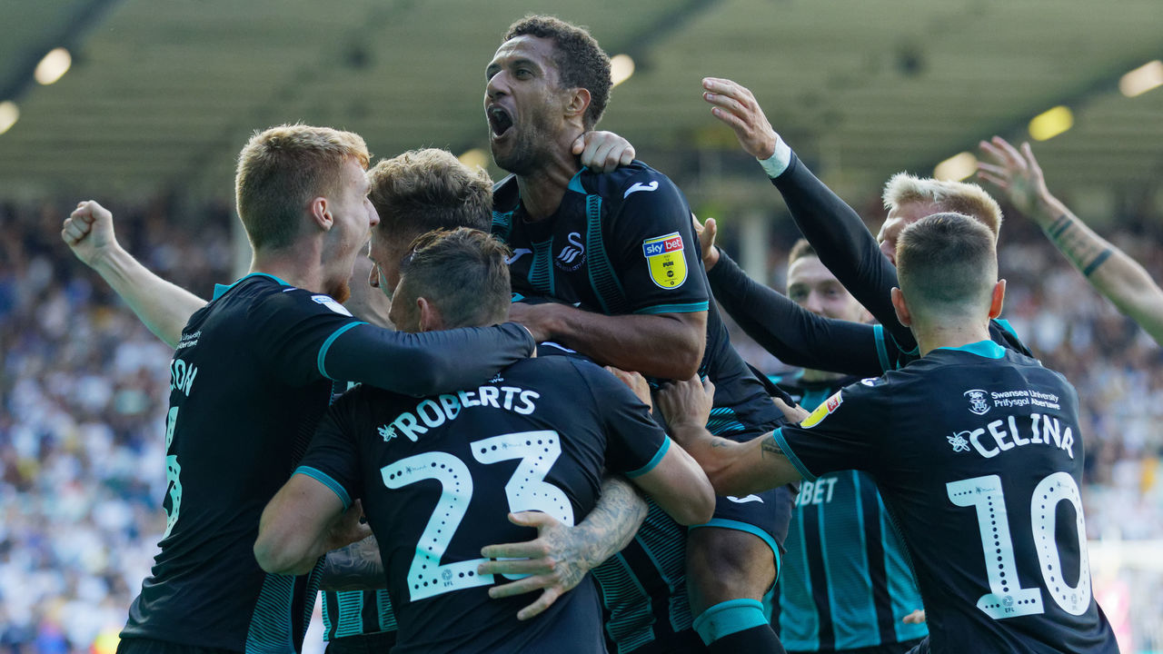 LEEDS, ENGLAND - AUGUST 31: Wayne Routledge of Swansea City celebrates his goal with team mates during the Sky Bet Championship match between Leeds United and Swansea City at Elland Road on August 31, 2019 in Leeds, England.
