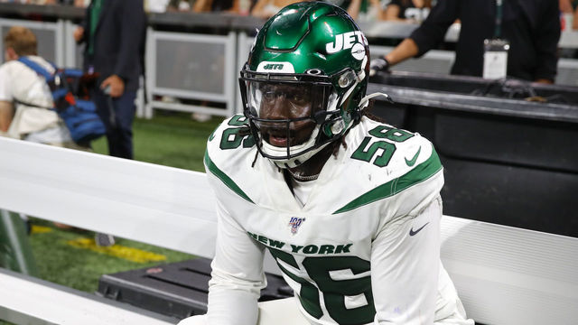 ATLANTA, GA - AUGUST 15: Jachai Polite #56 of the New York Jets rests on the bench during the second half of an NFL preseason game against the Atlanta Falcons at Mercedes-Benz Stadium on August 15, 2019 in Atlanta, Georgia.