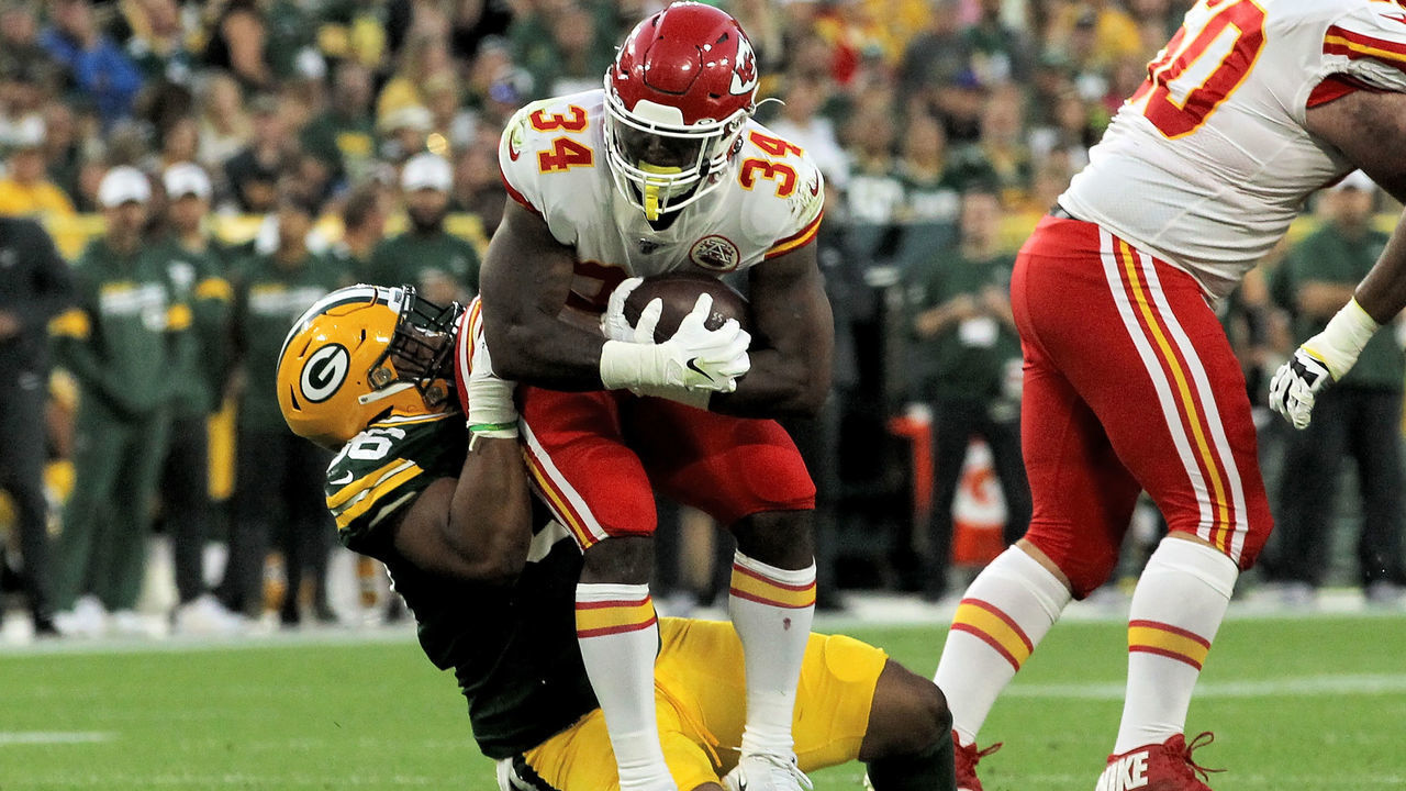 GREEN BAY, WISCONSIN - AUGUST 29: Kingsley Keke #96 of the Green Bay Packers tackles Dakari Monroe #43 of the Kansas City Chiefs in the first quarter during a preseason game at Lambeau Field on August 29, 2019 in Green Bay, Wisconsin.