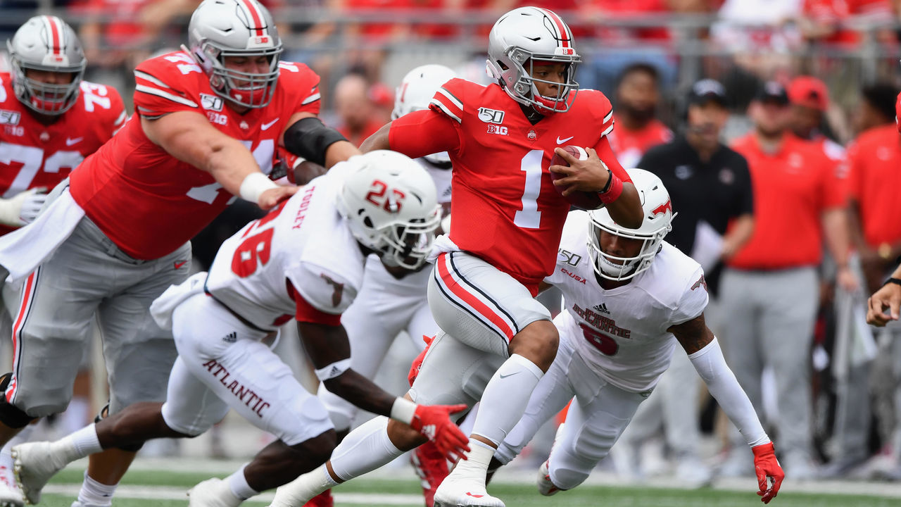 COLUMBUS, OH - AUGUST 31: Quarterback Justin Fields #1 of the Ohio State Buckeyes breaks free for a 51-yard touchdown run in the first quarter against the Florida Atlantic Owls at Ohio Stadium on August 31, 2019 in Columbus, Ohio.