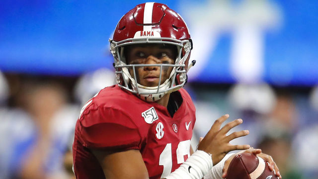 ATLANTA, GA - AUGUST 31: Alabama Crimson Tide quarterback Tua Tagovailoa (13) rolls out to pass in the second half of the Duke Blue Devils v Alabama Crimson Tide game August 31, 2019 at Mercedes-Benz Stadium in Atlanta, GA.