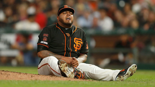 SAN FRANCISCO, CALIFORNIA - AUGUST 31: Pitcher Reyes Moronta #54 of the San Francisco Giants grasps his hand in the top of the sixth inning against the San Diego Padres at Oracle Park on August 31, 2019 in San Francisco, California.