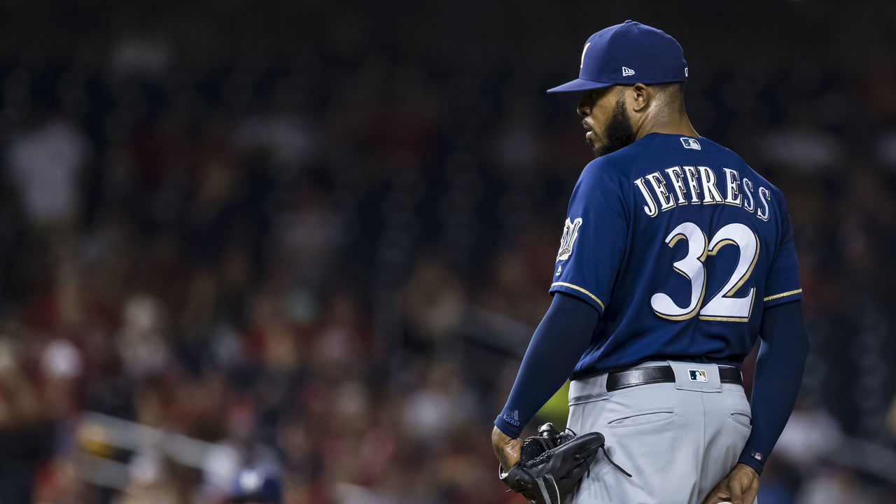 WASHINGTON, DC - AUGUST 17: Jeremy Jeffress #32 of the Milwaukee Brewers pitches against the Washington Nationals during the eleventh inning at Nationals Park on August 17, 2019 in Washington, DC.
