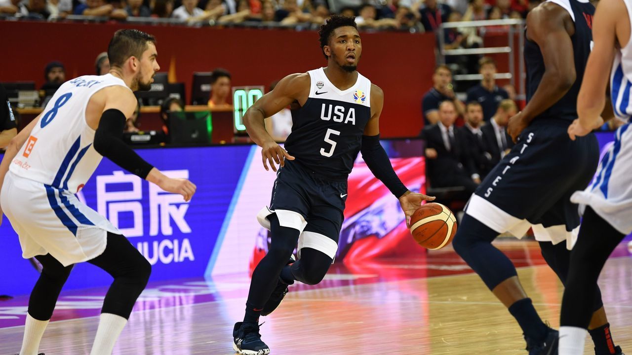 Donovan Mitchell (C) of the US dribbles the ball during the Basketball World Cup Group E game between Czech Republic and US in Shanghai on September 1, 2019.