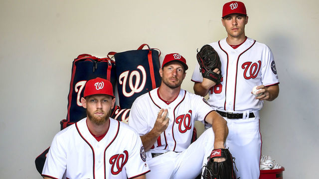 WEST PALM BEACH, FL - FEBRUARY 22: From left, Washington Nationals starting pitchers Stephen Strasburg (37), Max Scherzer (31), and Patrick Corbin (46) pose for a portrait during the team's Photo Day at the Nationals Spring Training complex at FITTEAM Ballpark of the Palm Beaches on Wednesday, February 22, 2019.