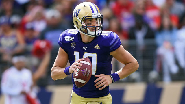 SEATTLE, WASHINGTON - AUGUST 31: Jacob Eason #10 of the Washington Huskies looks for an open receiver during the first game of the season against the Eastern Washington Eagles at Husky Stadium on August 31, 2019 in Seattle, Washington.